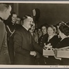 The Fuhrer, along with Reich Labor Front leader Dr. Ley, met with the outstanding men and women armaments workers who had received the War Merit Cross and thanked them for their efforts