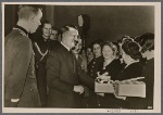 The Fuhrer, along with Reich Labor Front leader Dr. Ley, met with the outstanding men and women armaments workers who had received the War Merit Cross and thanked them for their efforts