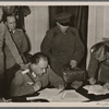 The entry of the Red Army into the Ukrainian and White Russian districts of Poland gave England and her allies an unpleasant surprise and left her "Ministry of Lies" unable to do anything but issue angry statements.  Our picture shows a German army commander with Russian officers in the former Voivodeschaft (district) of Bialystok during discussions concerning the placement of the agreed (German-Russian) demarcation line.