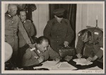 The entry of the Red Army into the Ukrainian and White Russian districts of Poland gave England and her allies an unpleasant surprise and left her "Ministry of Lies" unable to do anything but issue angry statements.  Our picture shows a German army commander with Russian officers in the former Voivodeschaft (district) of Bialystok during discussions concerning the placement of the agreed (German-Russian) demarcation line.