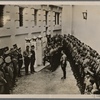 The movement in the Ostmark (Austria) honors the sacrifice made for the sake of a Greater Germany by those who were sentenced to hang for their part in the July Insurrection.  Our picture shows wreaths being laid at the three pylons marking the spot where the fighters sentenced by the Vienna District Court met their death on the gallows