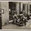 [The great air defense drill in Berlin demonstrated the perfect discipline of the capital's population.  In our picture, air raid wardens carry out "two dead" during the practice.]