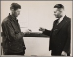 Farmer receiving rehabilitation loan from Resettlement Administration official, Jackson County, Ohio.