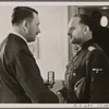 The Fuhrer received the Commander of Bodyguards, Chief SS Group Leader and General of the Waffen-SS, Sepp Dietrich, at his headquarters and decorated him with the Knight's Cross with Oak Leaves.