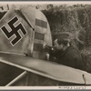 A new stroke is added. A German fighter pilot has the badges of 32 successful air battles affixed to the rudder of his machine. Each line a blow to England!