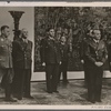 On October 26th the first anniversary of the General Government (of occupied Poland) was commemorated with a ceremony in the castle of Krakow.  Among those taking part were Chief of Staff of the S.A. Viktor Lutze, Reichs Interior Minister Dr. Frick, State Secretary Stuckardt, General Daluege, General-Governor/Reichs Minister Dr. Frank and Corps Führer of the N.S.K.K. (National Socialist Motor Corps) Hühnlein.
