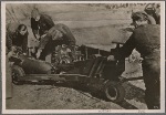 The Luftwaffe's actions against England continue without pause.  Again and again military installations in London and other English cities are the target of German bombs.  Our picture shows a bomb being moved to a bomber