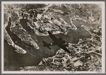 During all of April, Malta, the British stronghold in the Mediterranean, was under a continuous hail of German and Italian bombs.  A German Junkers 88 dive bomber is seen over the naval port of Valetta.
