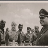 Field Marshal Kesselring in Africa.  The picture shows the Field marshal in a circle of flyers, talking to NCOs and crewmen.