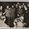 A delegation of Italian war victims relief administrators under the leadership of General Baccarini, who have come to a gathering of German/Italian war wounded in Berlin, are shown with Italian ambassador (to Germany) Alfieri."
