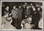 A delegation of Italian war victims relief administrators under the leadership of General Baccarini, who have come to a gathering of German/Italian war wounded in Berlin, are shown with Italian ambassador (to Germany) Alfieri."