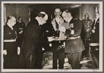 [An honor from the Fuhrer for Finnish State President Risto Ryti.  German envoy in Helsinki von Blucher presents the Golden Grand Cross of the German order of the Eagle.]