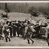 The Westwall remained on watch in a high state of combat readiness.  Exercises (went on) behind the front.  Here, for example, (are) a machine gun detachment and armored cars.