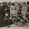 On Armed Forces Day, the barracks were opened to visitors, and people were allowed to shoot (in return) for (a contribution to) the War Winter Relief.  Here, members of the youngest military (age-)group sit at a machine gun.
