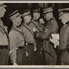 Everyone in the homeland is also ready, if required, to render the highest service.  In the name of the Führer, Chief of Staff Lutze awarded six men from Bremen the War Service Cross with Swords.