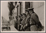[... Berlin was festively decorated.  Flags and garlands greeted the victors over France.  On the balcony of the Reichs Chancellery we see the Führer with his generals and the Foreign Minister (from left: Field Marshal Goering, the Führer, Grand Admiral Raeder, Colonel-General von Brauchitsch, Foreign Minister von Ribbentrop, Colonel-General Keitel).]