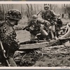 In front of the Western Wall reconnaissance exercises continue. Here a squad crosses a creek camouflaged against aerial detection.