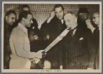 Reich Organization Leader Dr. Ley, who is staying in London in his capacity as president of the International Headquarters of "Freude und Arbeit", in conversation with a famous English cricketer.