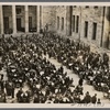 In the courtyard of the new Reich Chancellery, the Fuhrer partakes of the "one-pot" communal stew meal in the company of invited fellow citizens.