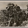 While the German forces on the Kerch Peninsula were preparing to defeat the Bolsheviks, (Soviet General) Timoshenko tried, using a huge concentration of troops, to get his hands on the region of Kharkov, an important and vital city in the Ukraine. Using a deep defense, German divisions succeed in stopping a Soviet attack. (Here we see) infantry in the front-line trenches.