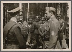 On June 4th Adolf Hitler made a surprise visit to the headquarters of Marshal Mannerheim of Finnland in order to personally deliver his best wishes and those of the German people on the occasion of the Marshal's 75th birthday.  The Fuhrer in conversation with Field Marshal Mannerheim; at left General Field Marshal Keitel; between the two statesmen Reich Press Chief Dr. Dietrich.