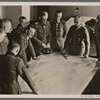 [The Fuhrer at a briefing with his generals in the East.  At right General Field Marshal von Bock, at the Fuhrer's left General Field Marshal Keitel.]