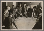 [The Fuhrer at a briefing with his generals in the East.  At right General Field Marshal von Bock, at the Fuhrer's left General Field Marshal Keitel.]