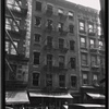 [Storefronts and vacant tenement: 154-158 [street unknown], Manhattan]