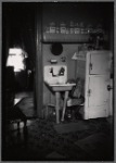 Kitchen interior with sink and ice box