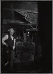 Inspector in basement with heater