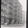 [Storefronts and tenements; Odessa Hand Laundry: 272 [street unknown], Manhattan]