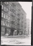 [Storefronts and tenements; Odessa Hand Laundry: 272 [street unknown], Manhattan]