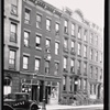 Storefronts and tenements; M. Asinofsky Fancy Groceries: 300-310 E. 80th St.-2nd Ave., Manhattan