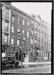 Storefronts and tenements; M. Asinofsky Fancy Groceries: 300-310 E. 80th St.-2nd Ave., Manhattan