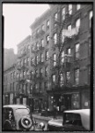 Storefronts and tenements; Angelo's Barber Shop