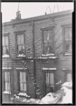 Wood frame tenements with fire escapes