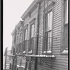Wood frame tenements with fire escapes