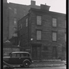 Closer view of vacant wood frame tenements: W. 17th St. - 9th Ave., Manhattan