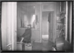 Tenement interior with male resident