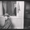 Tenement interior with male resident