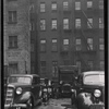 Tenement rear; parking lot: Manhattan