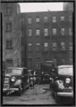 Tenement rear; parking lot: Manhattan