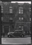 Brick row house; watchmaker on first floor, shoeshine stand outside: Saratoga Ave.-Riverdale Av-Livonia, Brooklyn