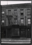 Row houses with vacant storefront