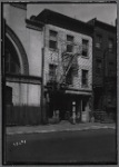 Row houses; barber shop