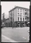 Brick row houses with vacant shops: Hicks St. - Sackett St., Brooklyn