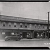 Stucco row houses & storefronts; Hollis Delicatessen: 196-21 Jamaica av-Woodhull Av, Queens