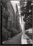 Brownstones, elevated train track