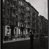 Tenements, some vacant; church: Manhattan