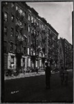 Tenements, some vacant; church: Manhattan